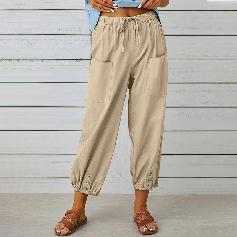 Damesbroek met elastische tailleband en knoopdetails – comfortabel, stijlvol en praktisch