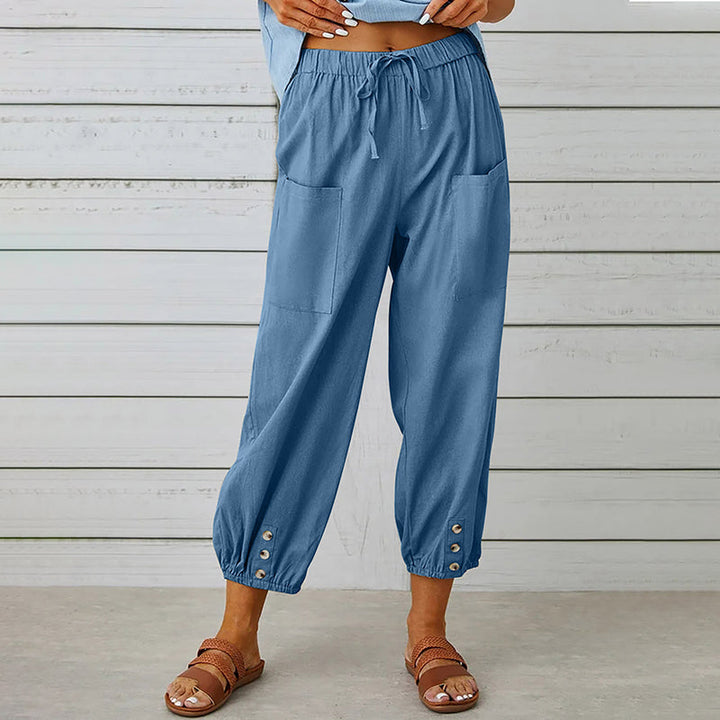 Damesbroek met elastische tailleband en knoopdetails – comfortabel, stijlvol en praktisch