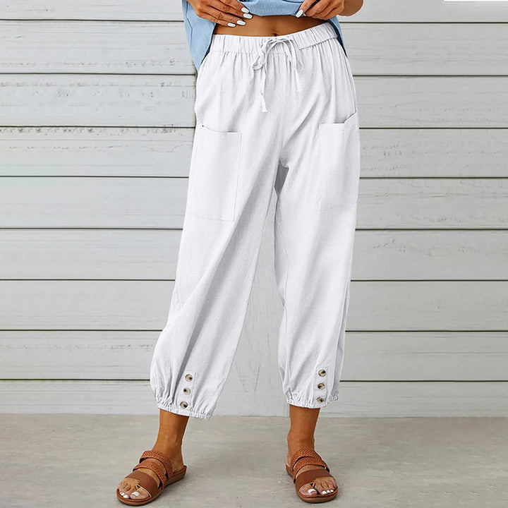 Damesbroek met elastische tailleband en knoopdetails – comfortabel, stijlvol en praktisch