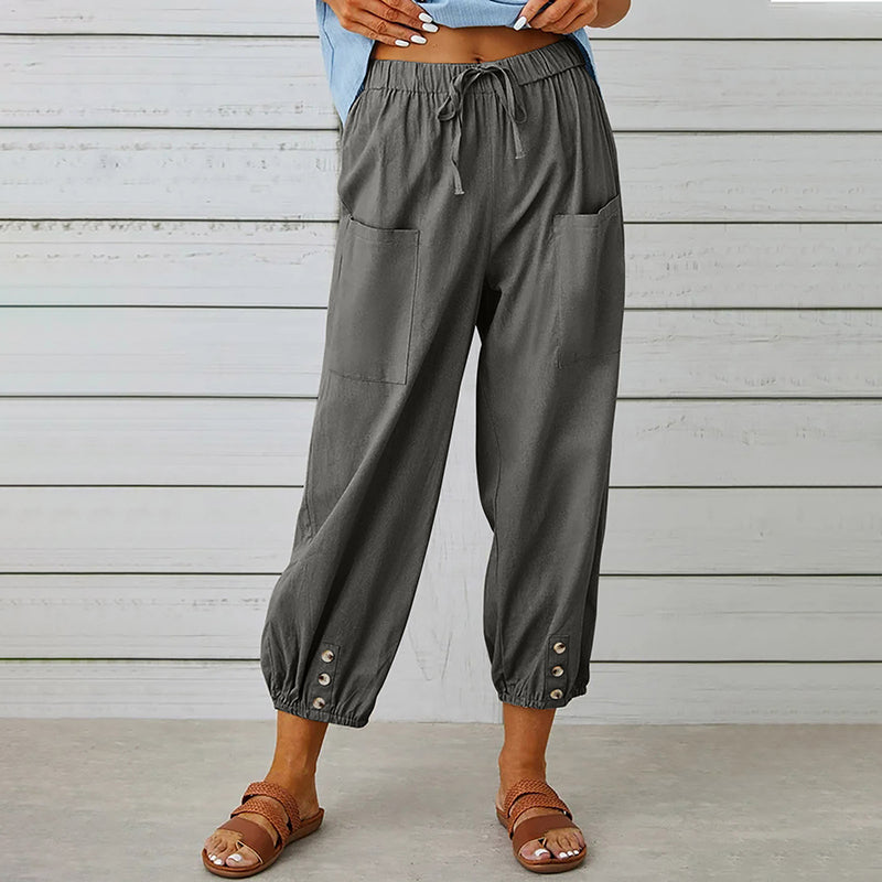 Damesbroek met elastische tailleband en knoopdetails – comfortabel, stijlvol en praktisch