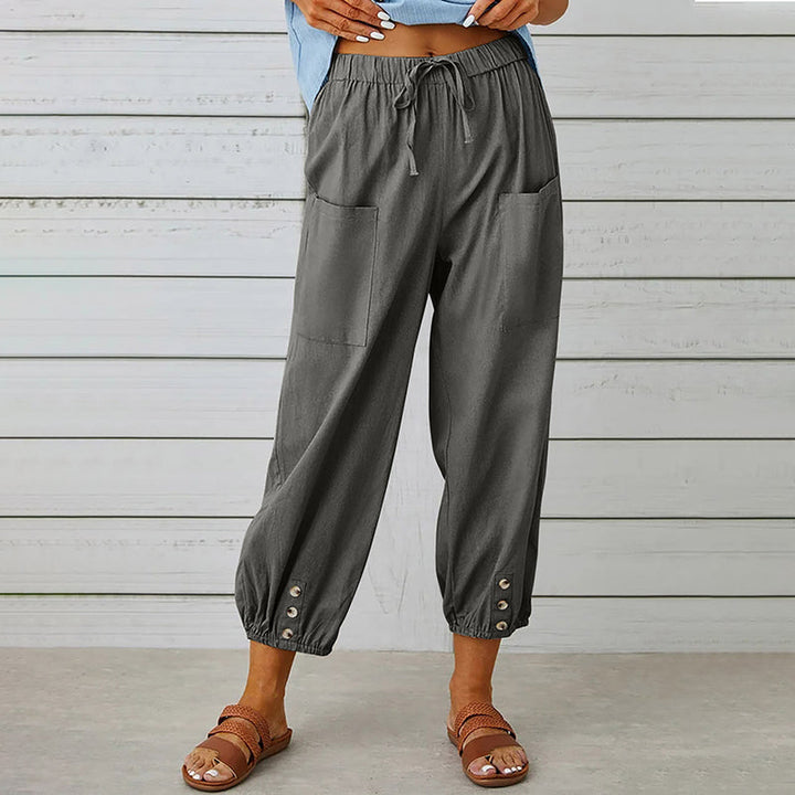 Damesbroek met elastische tailleband en knoopdetails – comfortabel, stijlvol en praktisch