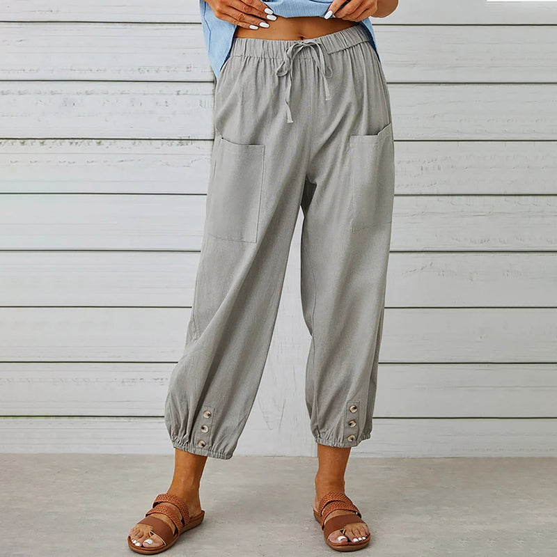 Damesbroek met elastische tailleband en knoopdetails – comfortabel, stijlvol en praktisch