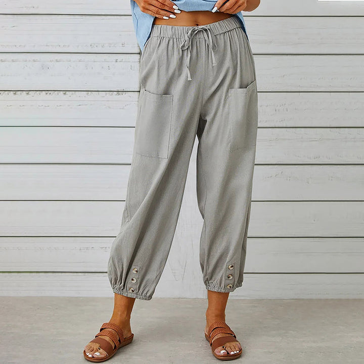 Damesbroek met elastische tailleband en knoopdetails – comfortabel, stijlvol en praktisch