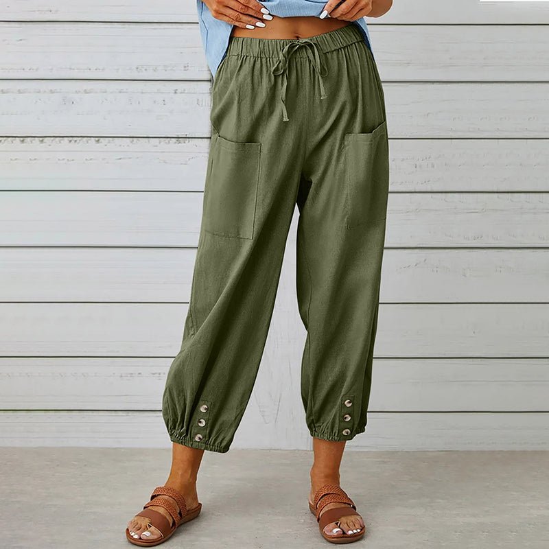 Damesbroek met elastische tailleband en knoopdetails – comfortabel, stijlvol en praktisch