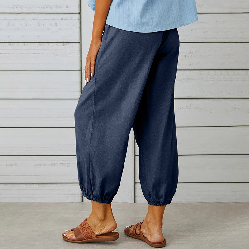 Damesbroek met elastische tailleband en knoopdetails – comfortabel, stijlvol en praktisch
