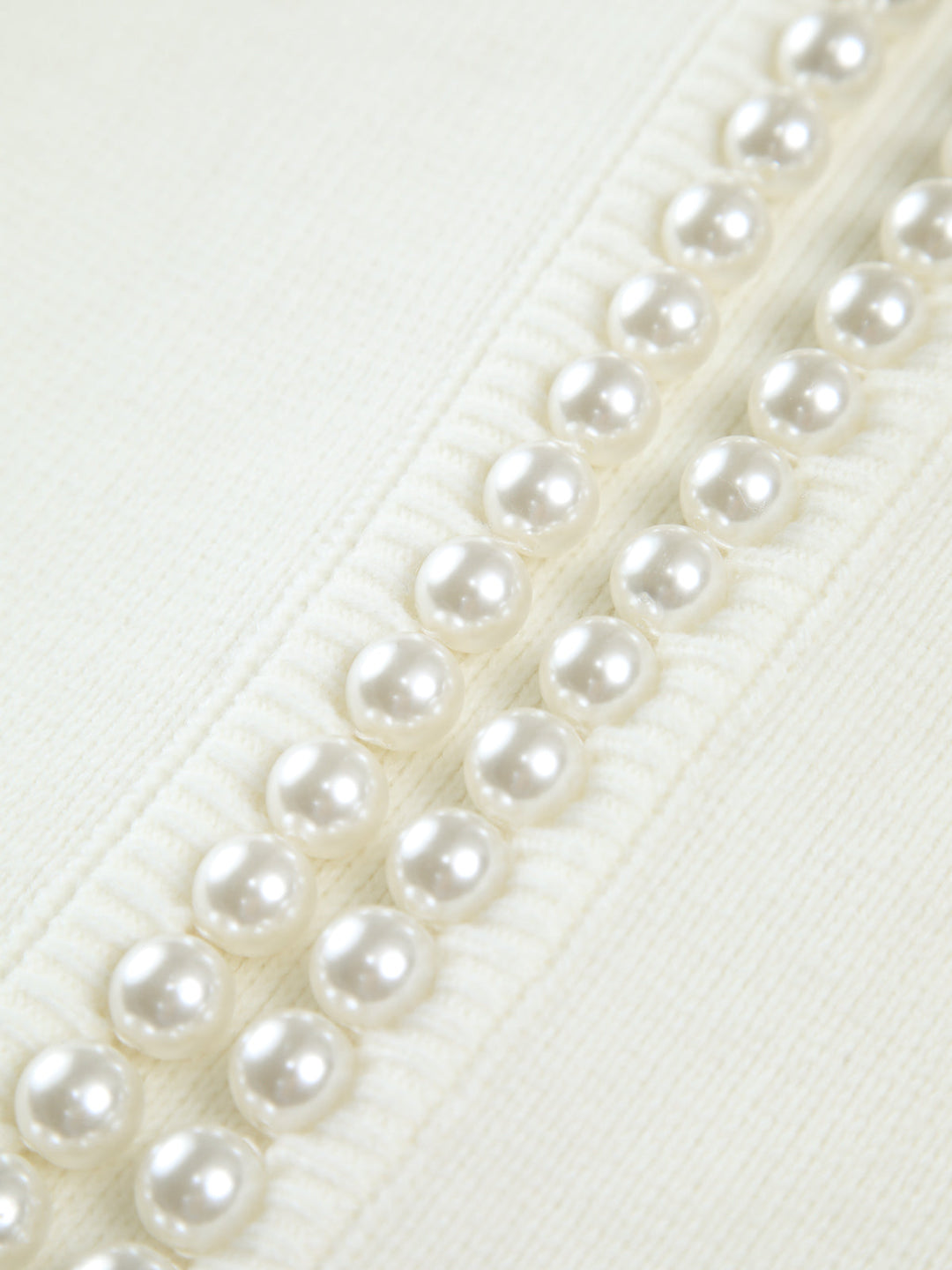 Gebreid Vest met Pareldetail en Rafelige Zoom