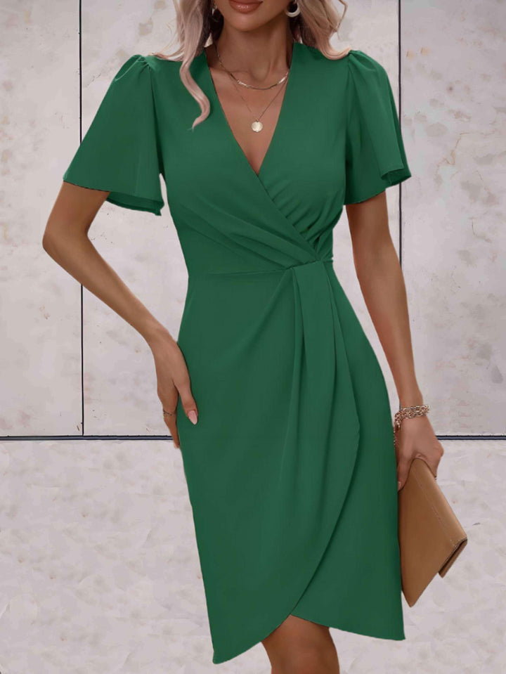 Alina - Chique Slim Fit Jurk met Zwierige Mouwen