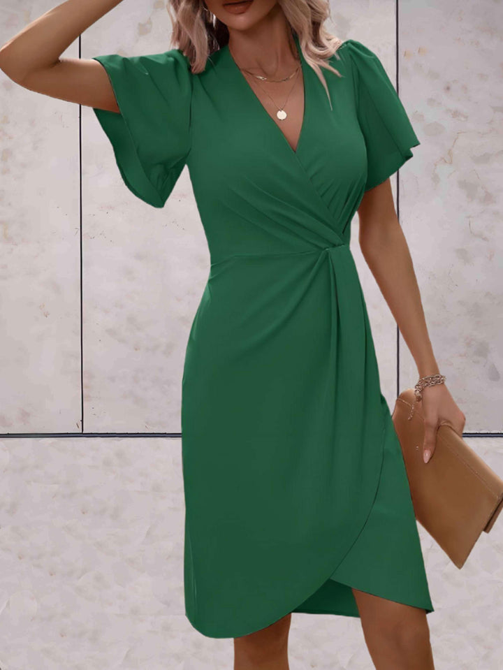 Alina - Chique Slim Fit Jurk met Zwierige Mouwen