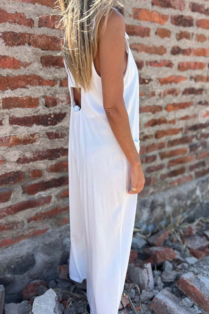 Liselot – Mouwloze Jumpsuit met Knoopsluiting en Open Rug