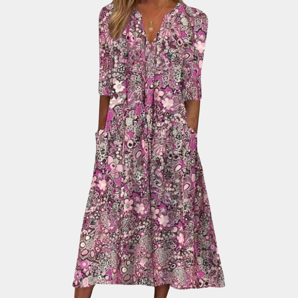 Gebloemde damesjurk met elegant ontwerp en luchtige pasvorm