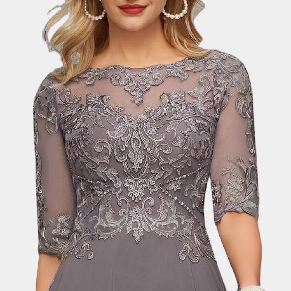 Elegante feestjurk met kanten details en flatterende pasvorm