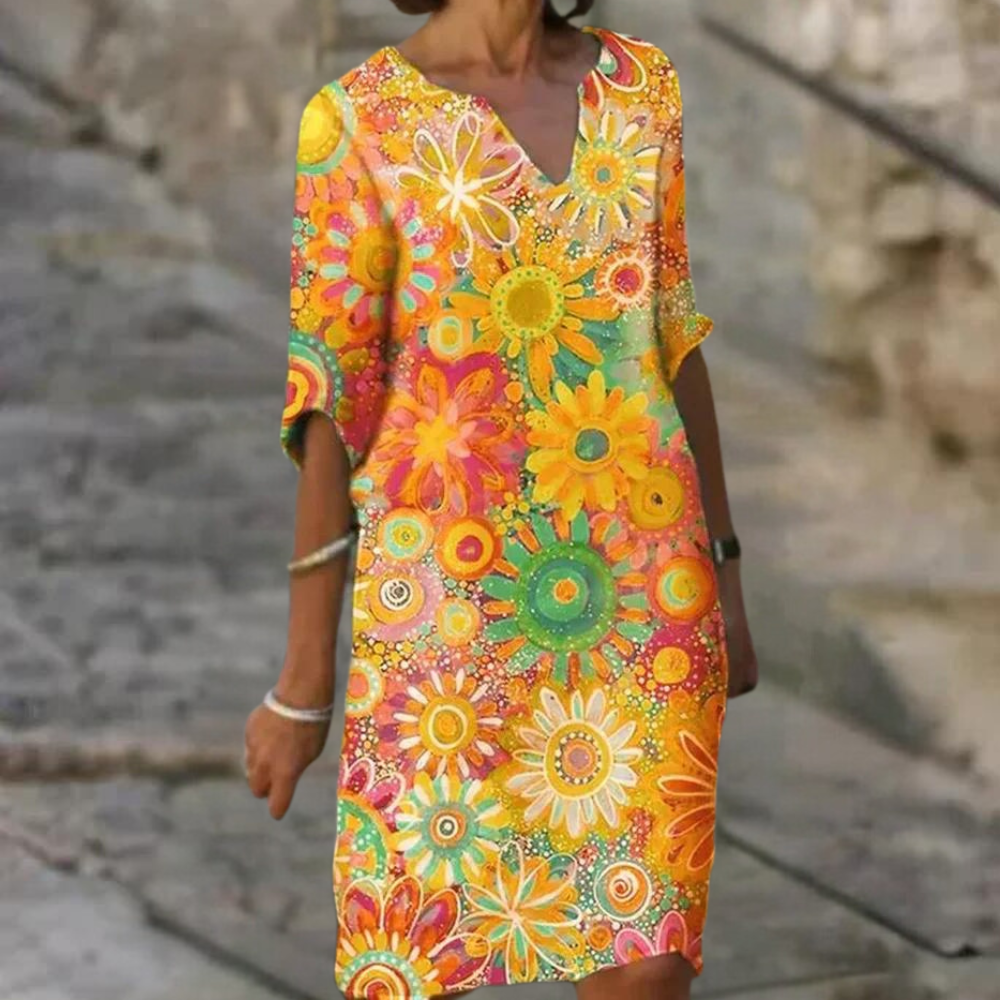 Elegante bloemenjurk met flatterende pasvorm en tijdloze print