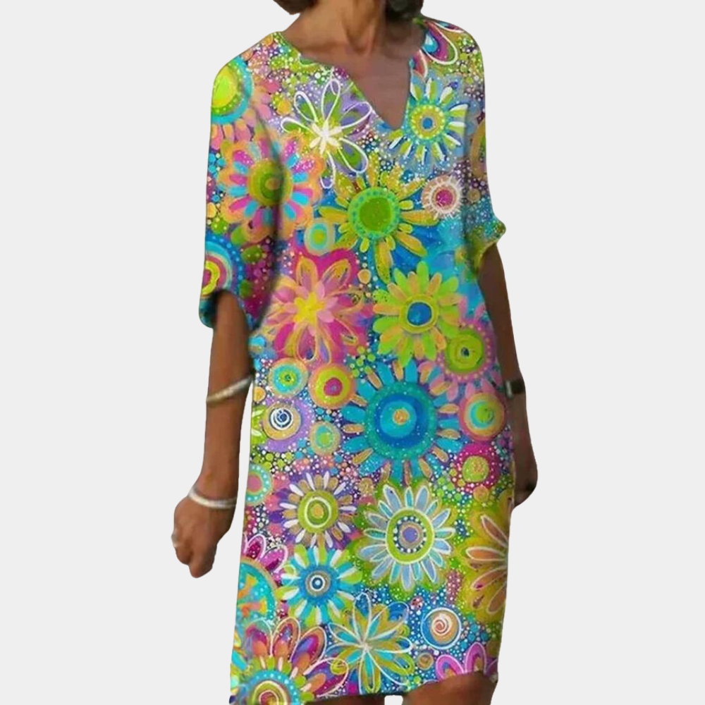 Elegante bloemenjurk met flatterende pasvorm en tijdloze print
