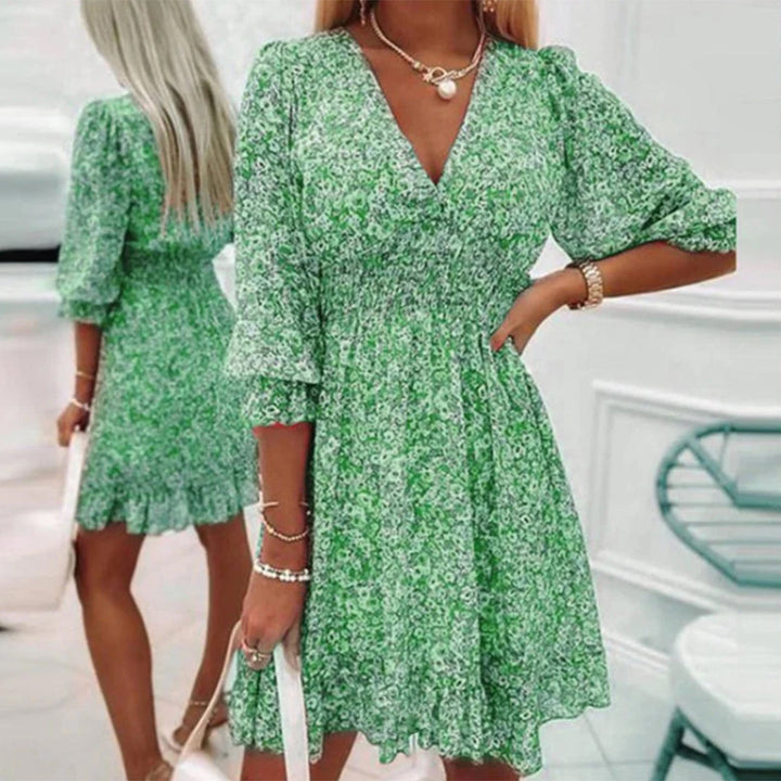 Midi zomerjurk met V-hals en korte mouwen voor een elegante zomerse look