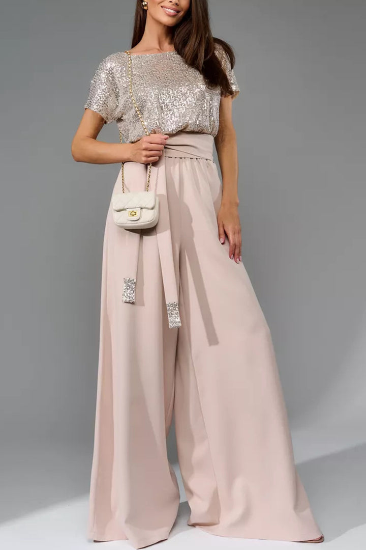 Nina – Jumpsuit met Pailletten en Open Rug