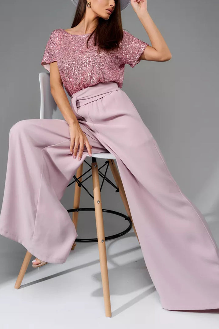 Nina – Jumpsuit met Pailletten en Open Rug