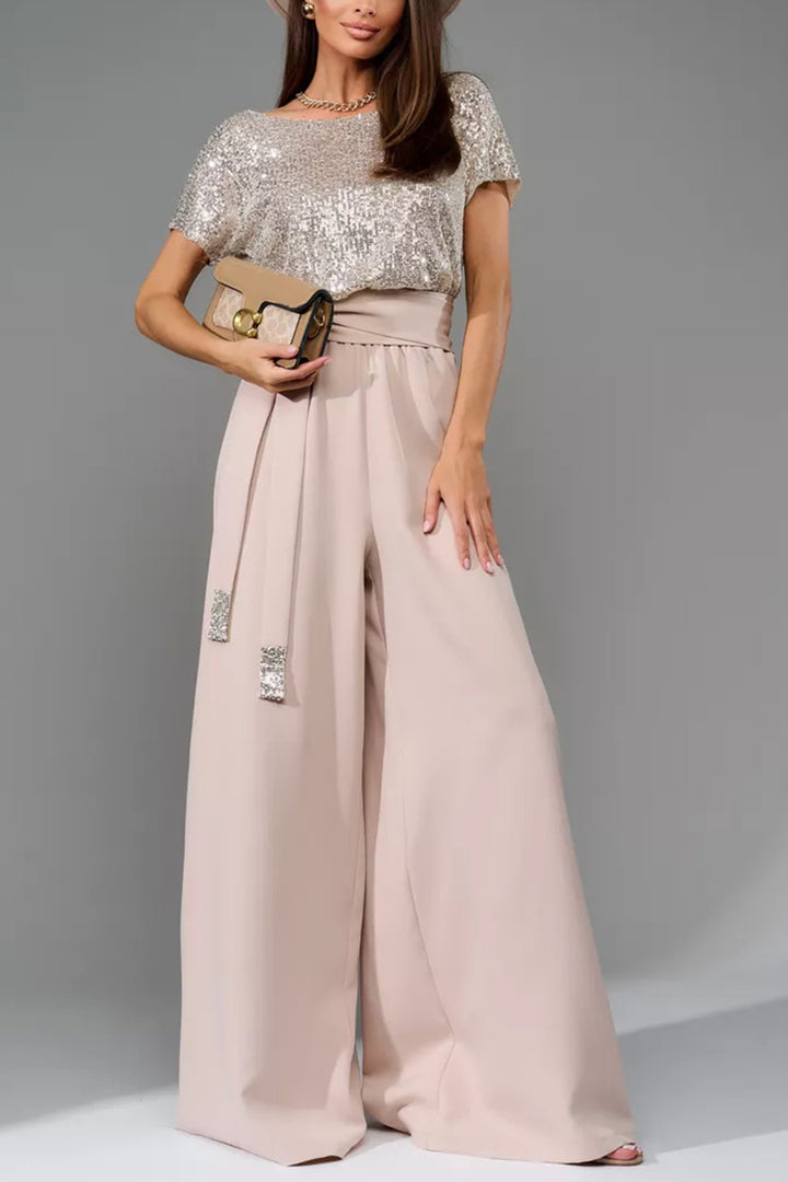 Nina – Jumpsuit met Pailletten en Open Rug