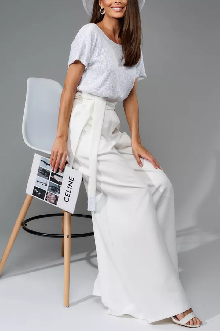 Nina – Jumpsuit met Pailletten en Open Rug
