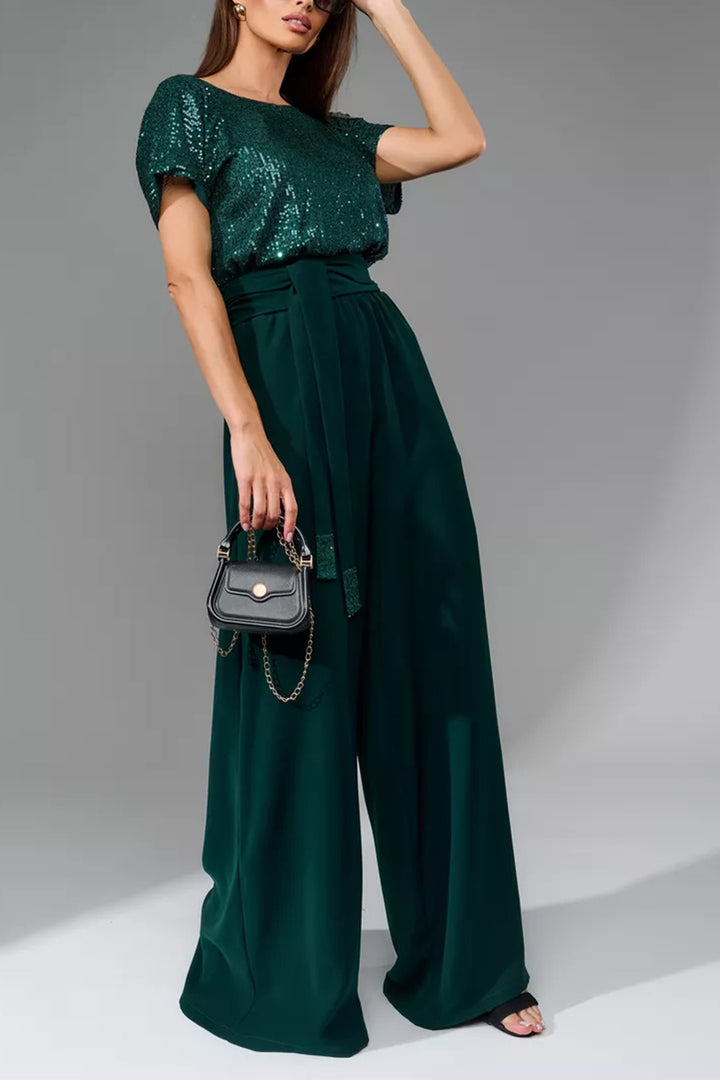 Nina – Jumpsuit met Pailletten en Open Rug