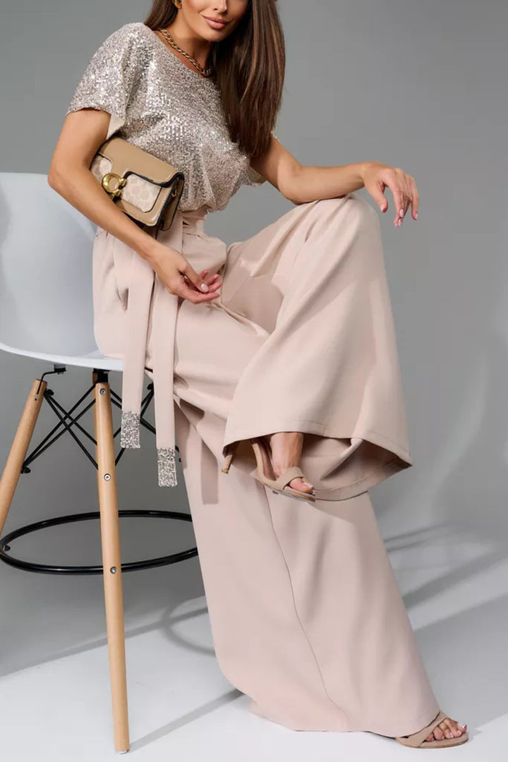 Nina – Jumpsuit met Pailletten en Open Rug