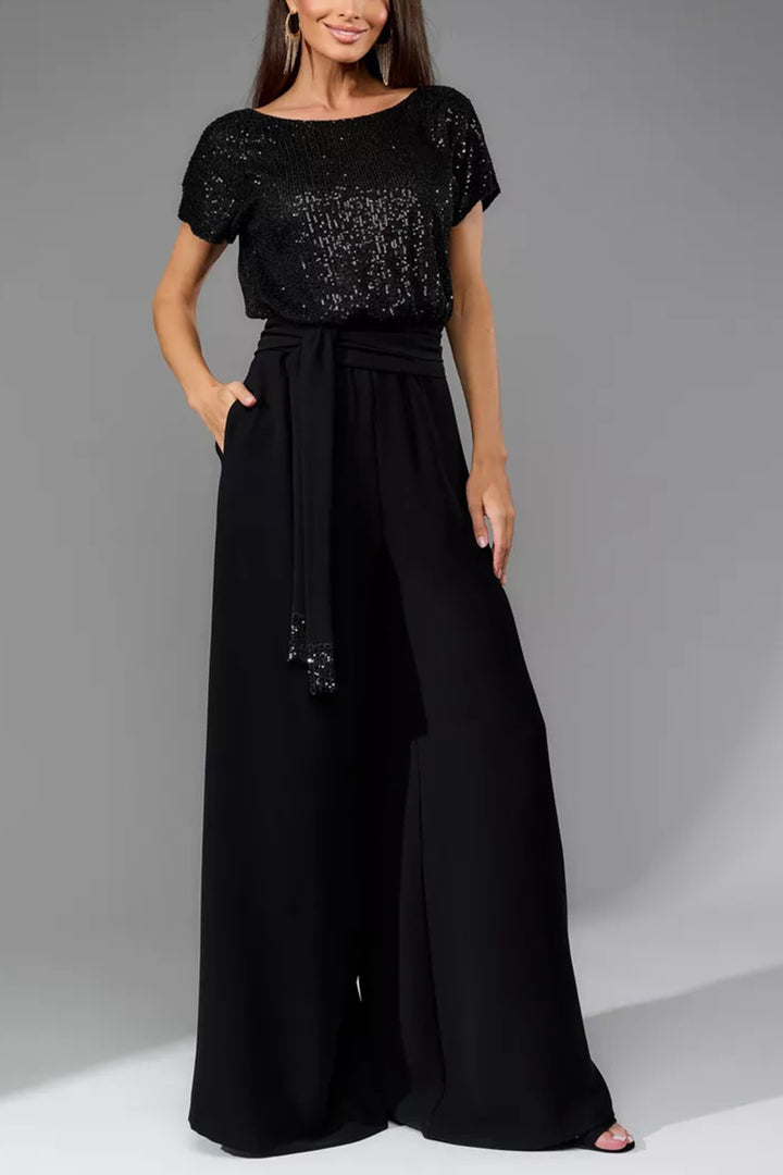 Nina – Jumpsuit met Pailletten en Open Rug