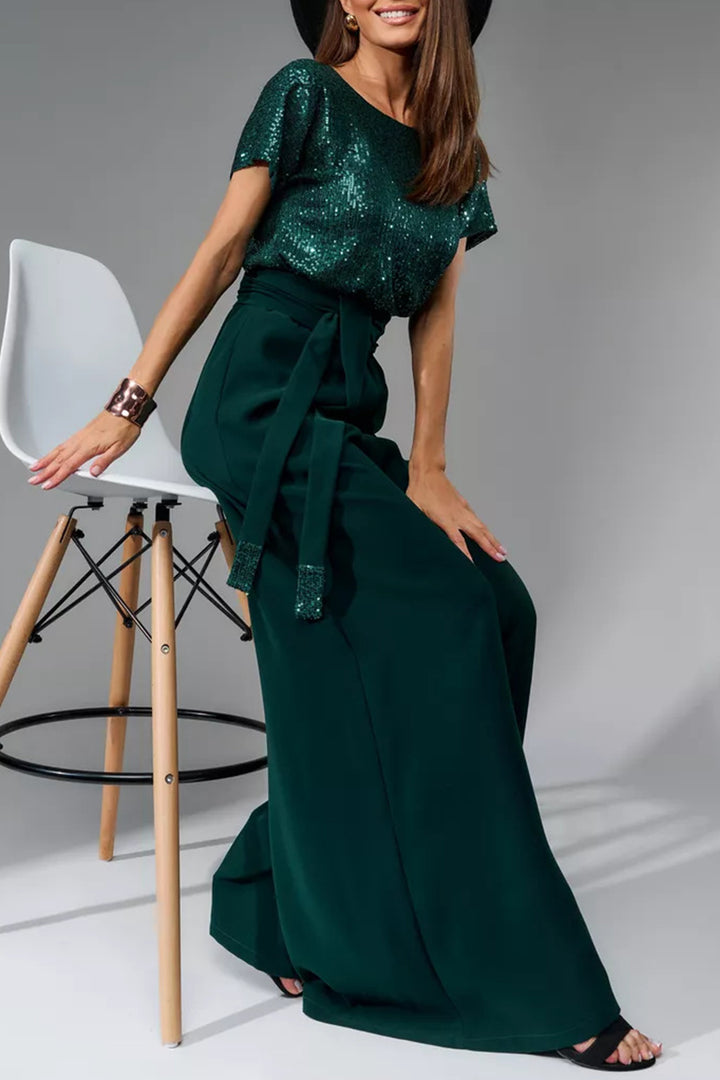 Nina – Jumpsuit met Pailletten en Open Rug
