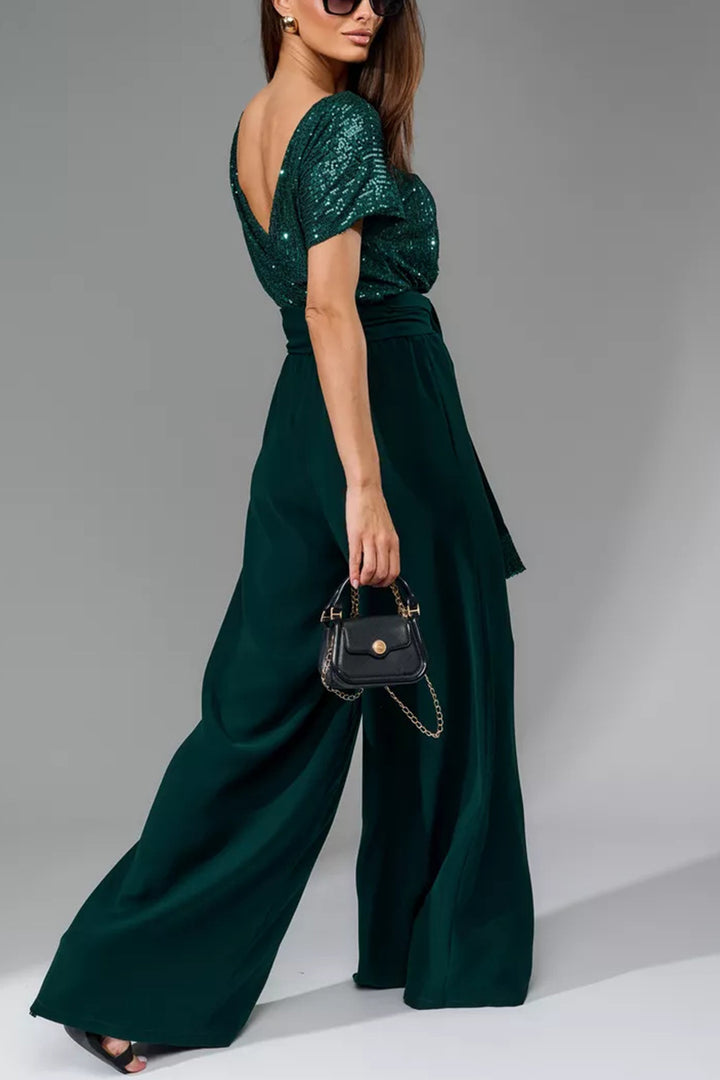 Nina – Jumpsuit met Pailletten en Open Rug