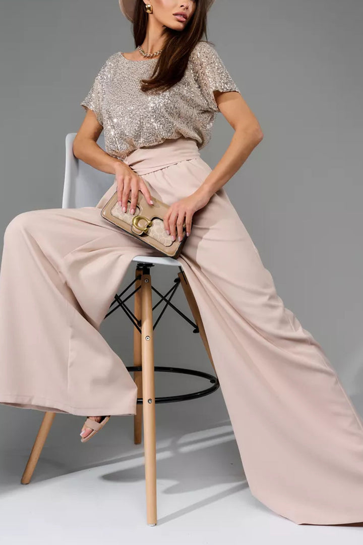 Nina – Jumpsuit met Pailletten en Open Rug
