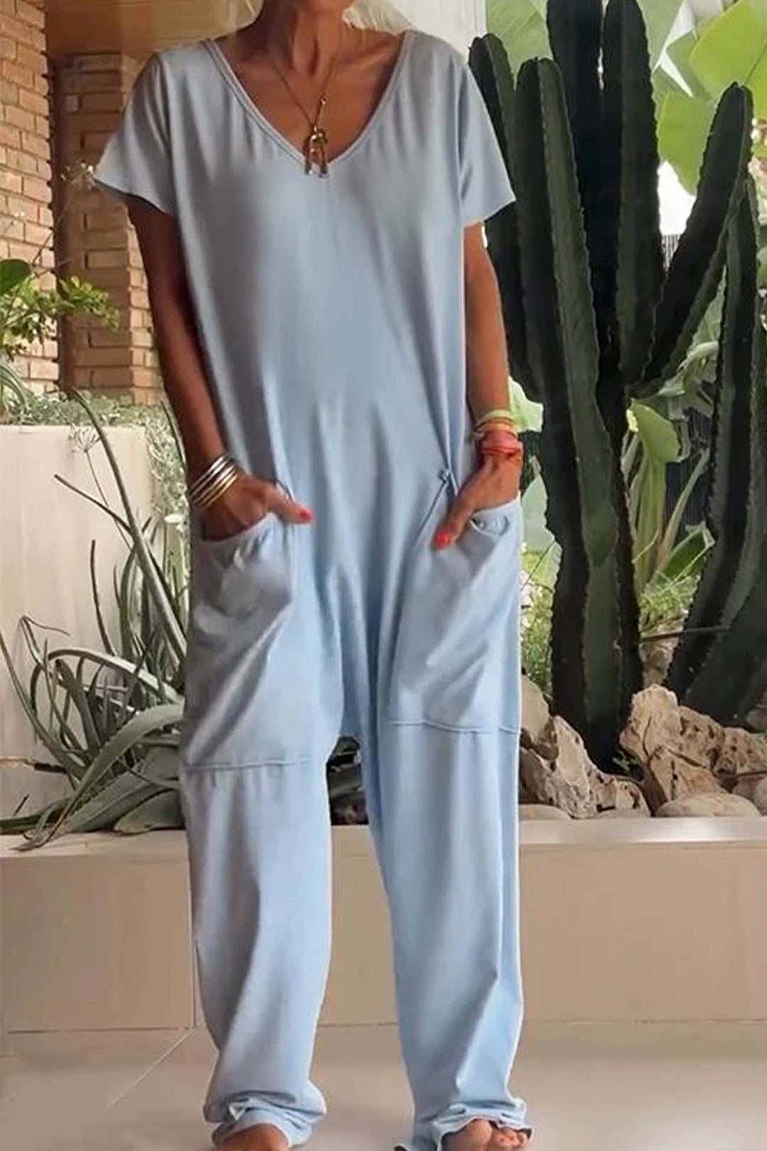Sien – Baggy Jumpsuit met V-Hals en Zakken