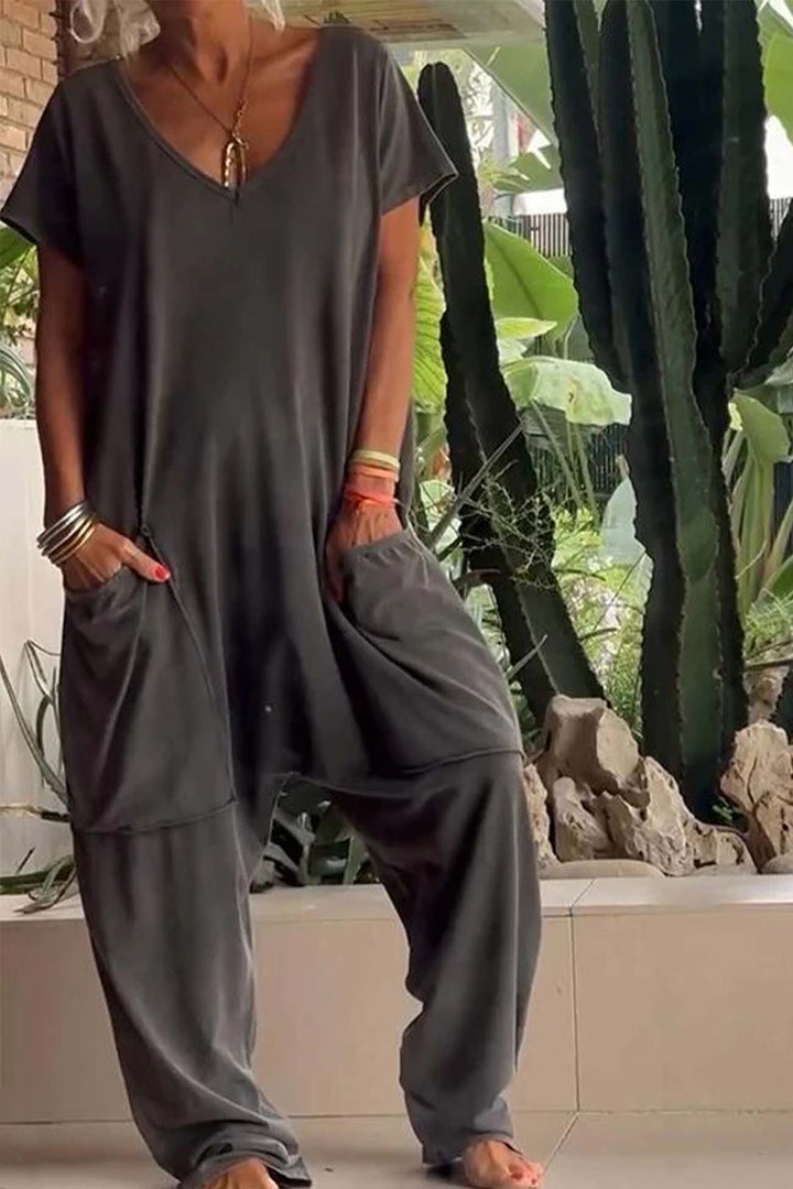 Sien – Baggy Jumpsuit met V-Hals en Zakken