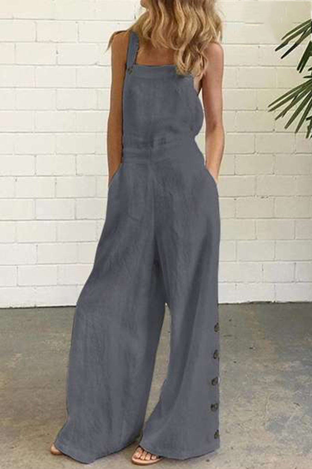 Tess – Mouwloze Jumpsuit met Knoopsluiting en Wijde Pijpen