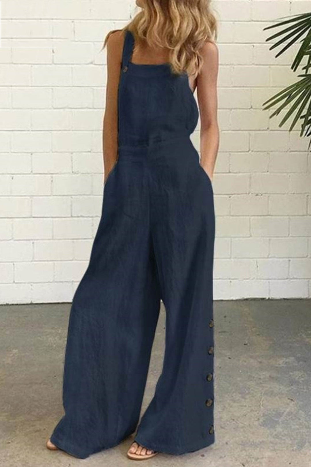 Tess – Mouwloze Jumpsuit met Knoopsluiting en Wijde Pijpen