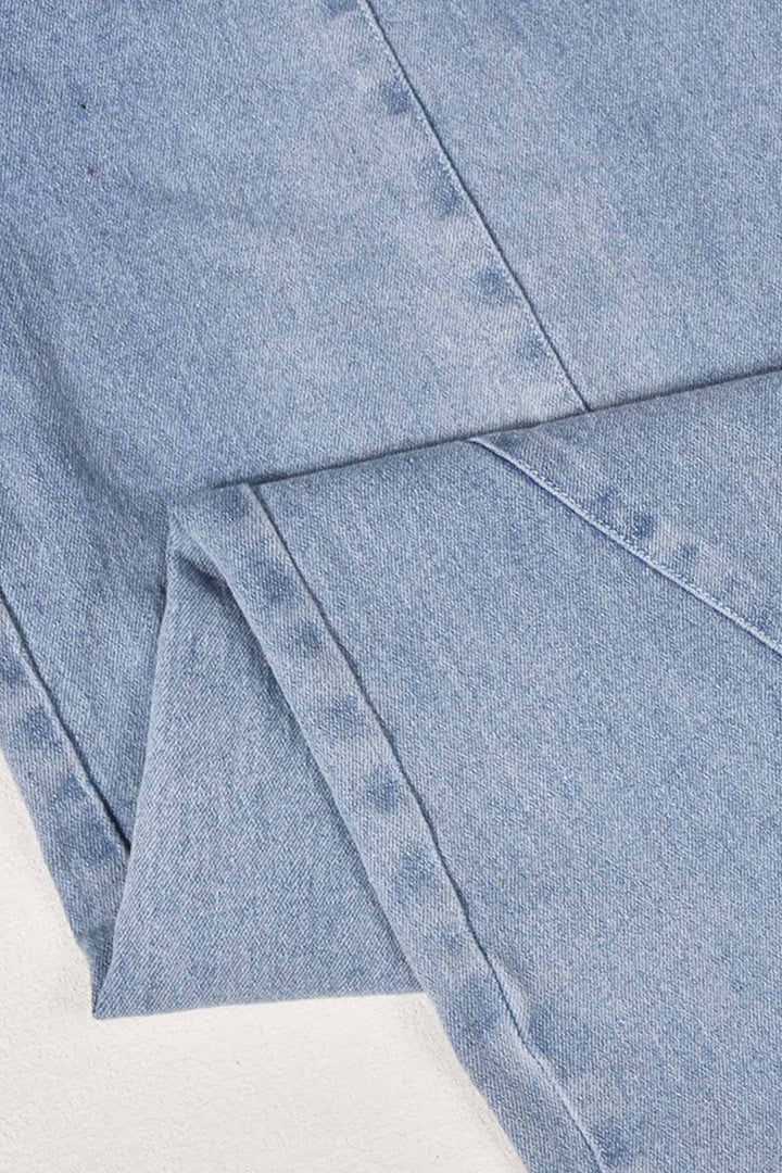Tessa – Strapless Denim Jumpsuit met Grote Zak en Open Rug