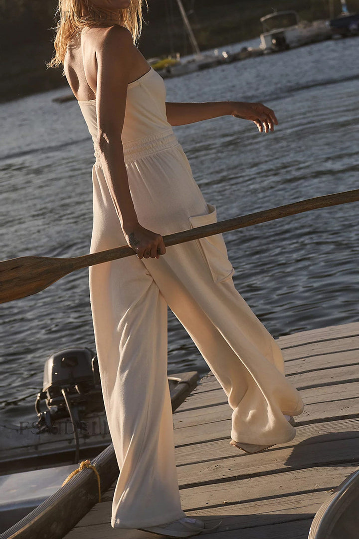 Lara – Strapless Jumpsuit met Strikceintuur en Wijde Pijpen