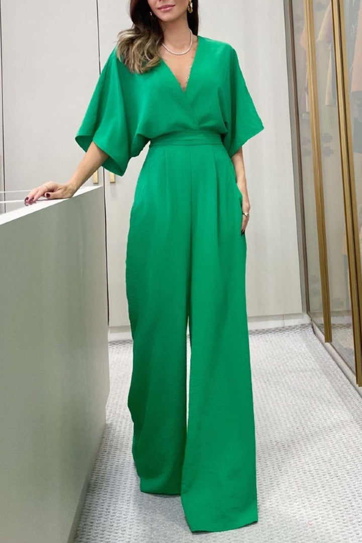 Mila – Jumpsuit met V-Hals, Vleermuismouwen en Open Rug