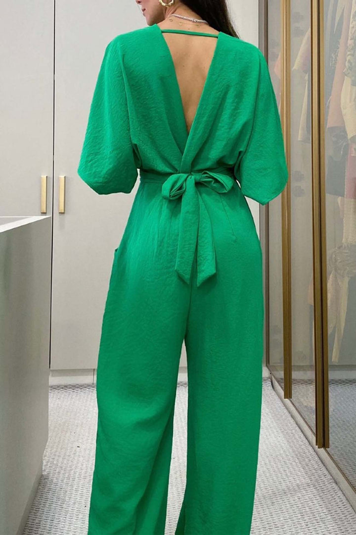 Mila – Jumpsuit met V-Hals, Vleermuismouwen en Open Rug