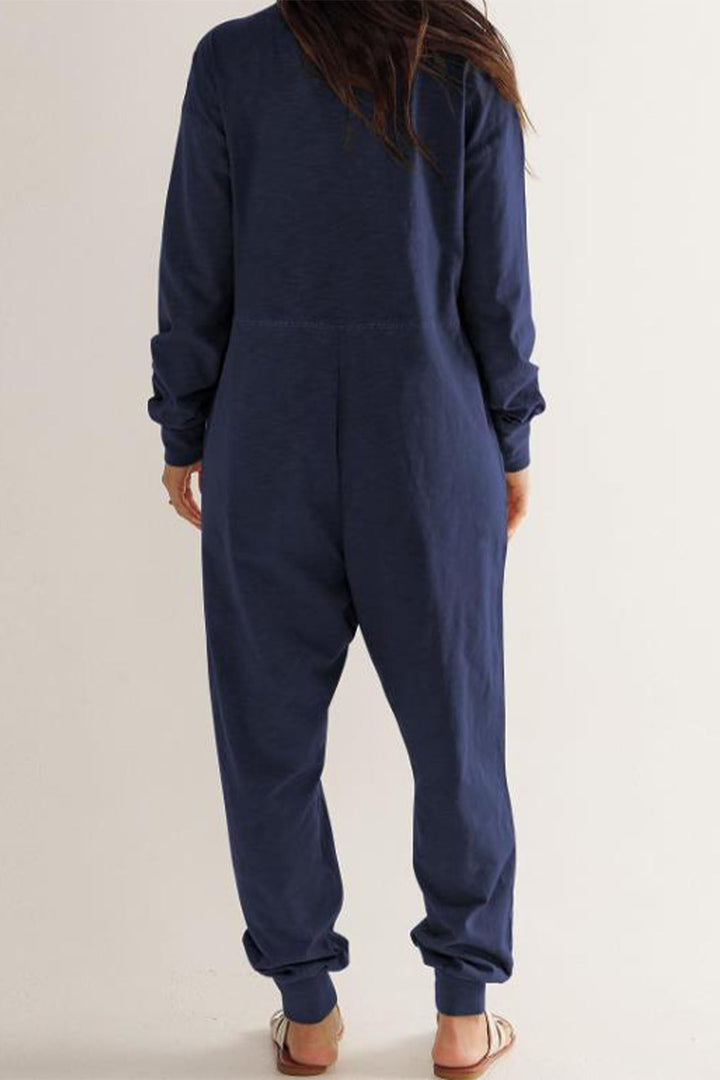 Sofie – Jumpsuit met V-Hals, Lage Schouders en Lange Mouwen