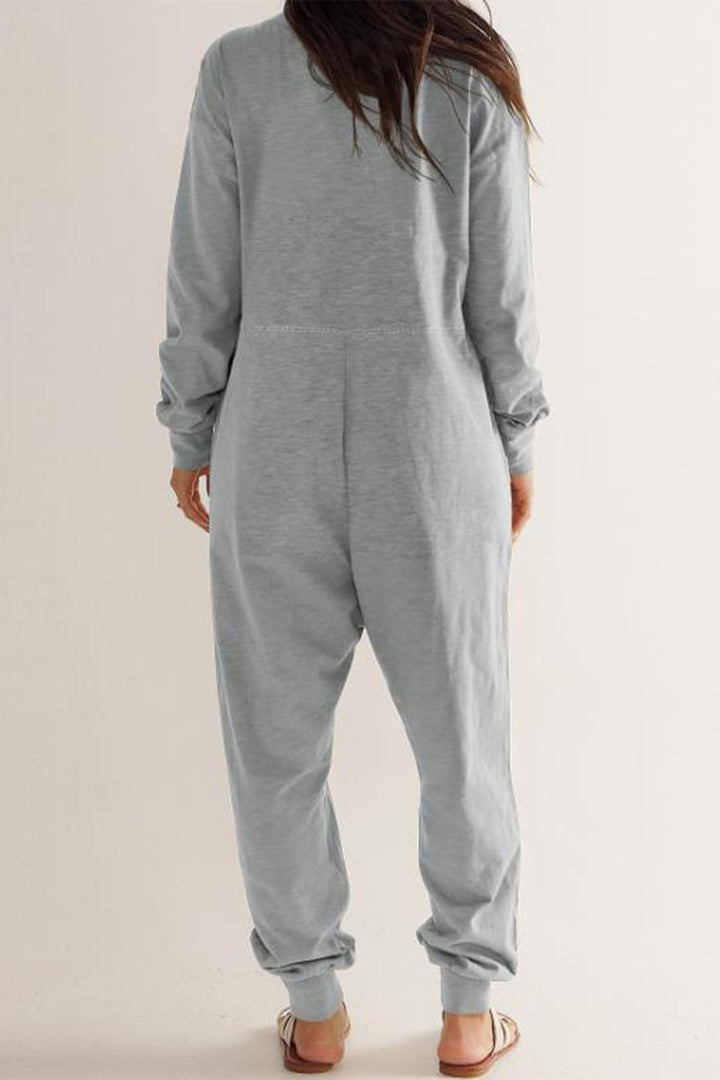 Sofie – Jumpsuit met V-Hals, Lage Schouders en Lange Mouwen