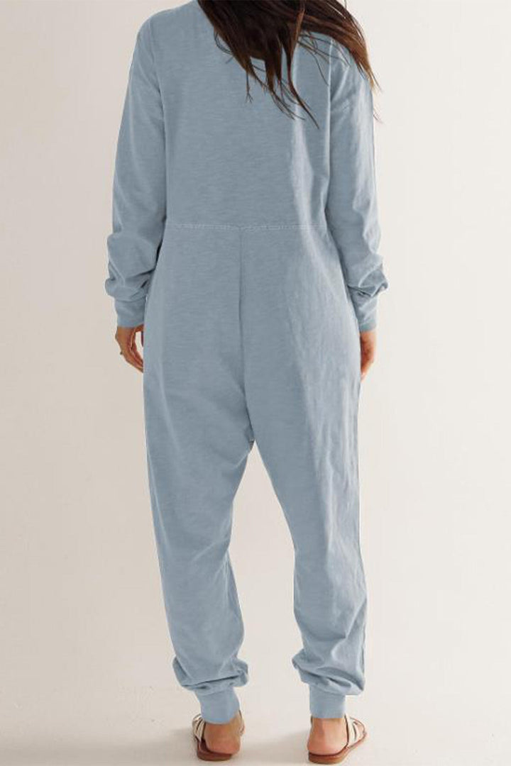 Sofie – Jumpsuit met V-Hals, Lage Schouders en Lange Mouwen