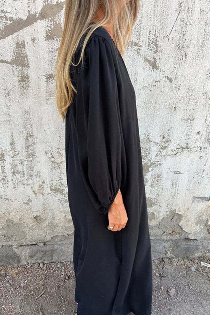 Jinte – Maxi Jurk met V-Hals en Ballonmouwen