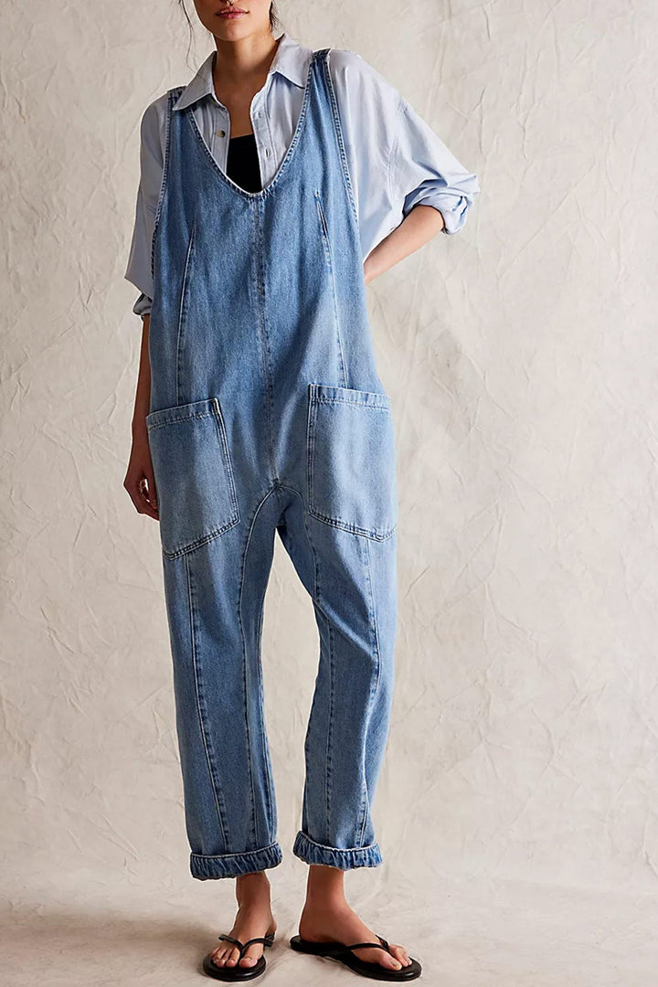Linde – Mouwloze Denim Jumpsuit met V-Hals en Verstelbare Bandjes