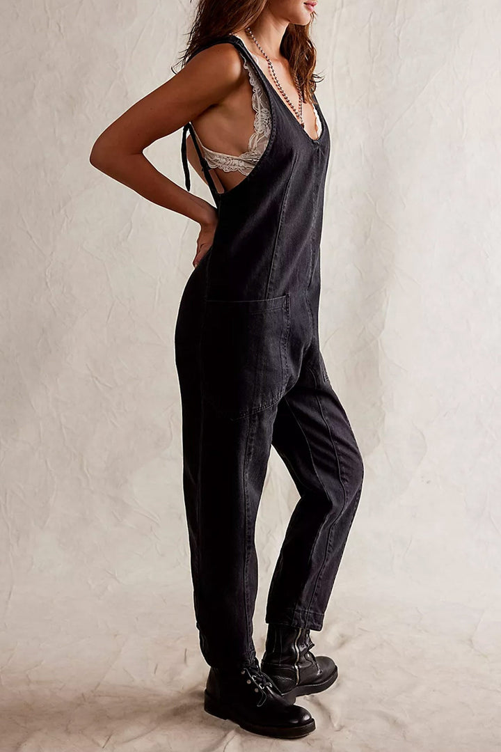 Linde – Mouwloze Denim Jumpsuit met V-Hals en Verstelbare Bandjes