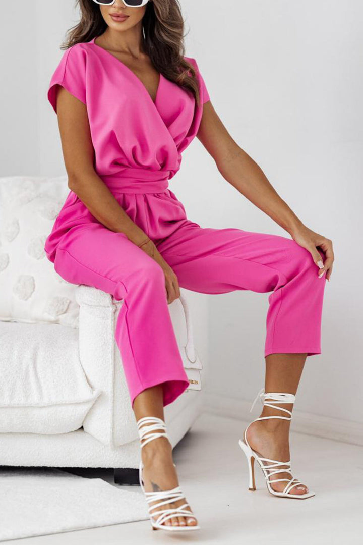 Elin – Jumpsuit met V-Hals, Strikceintuur en Steekzakken