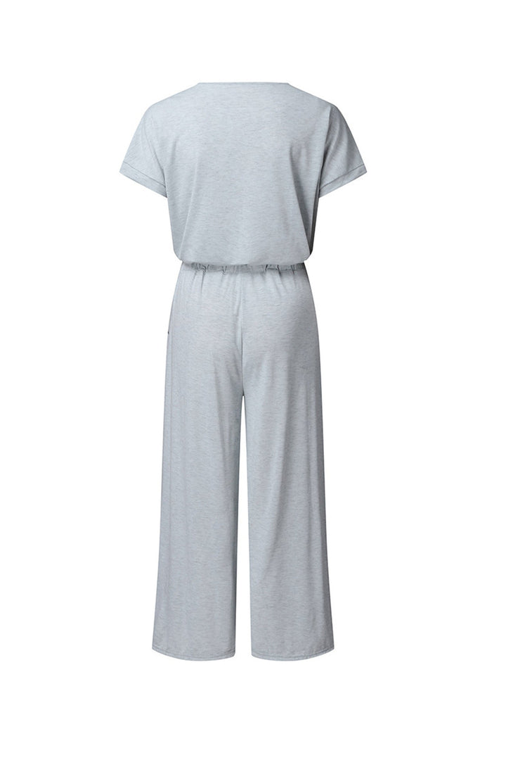 Nina – Jumpsuit met V-Hals, Korte Mouwen en Elastische Taille