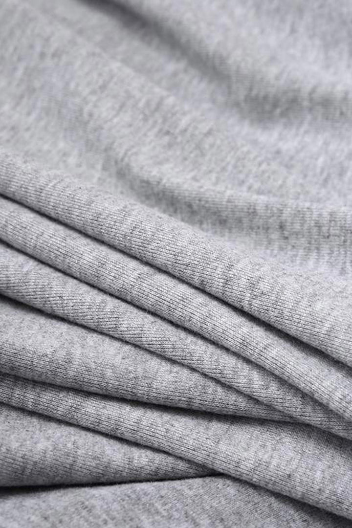 Tessa – Sweaterjurk met V-Hals en Splitzoom