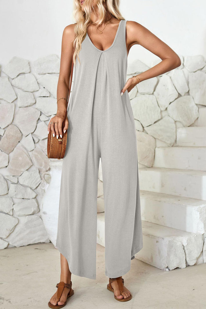 Maren – Katoenen Jumpsuit met V-Hals en Asymmetrische Zoom