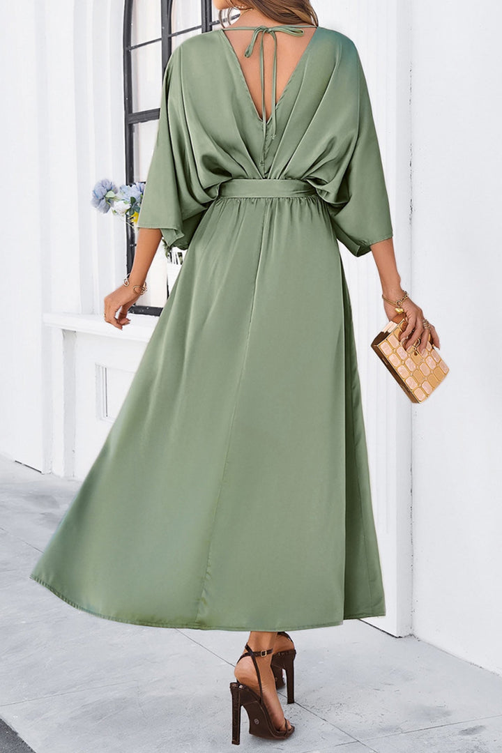 Mare – Maxi Jurk met Strikceintuur en Vleermuismouwen