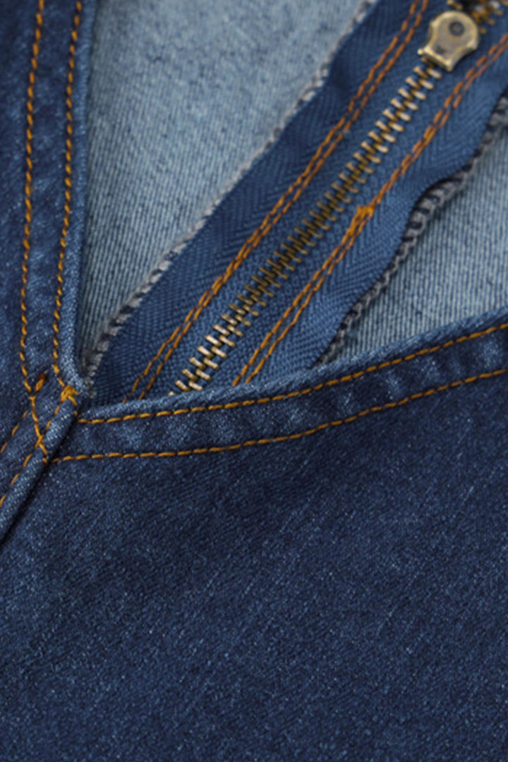 Saar – Mouwloze Denim Jumpsuit met Rits en Open Rug