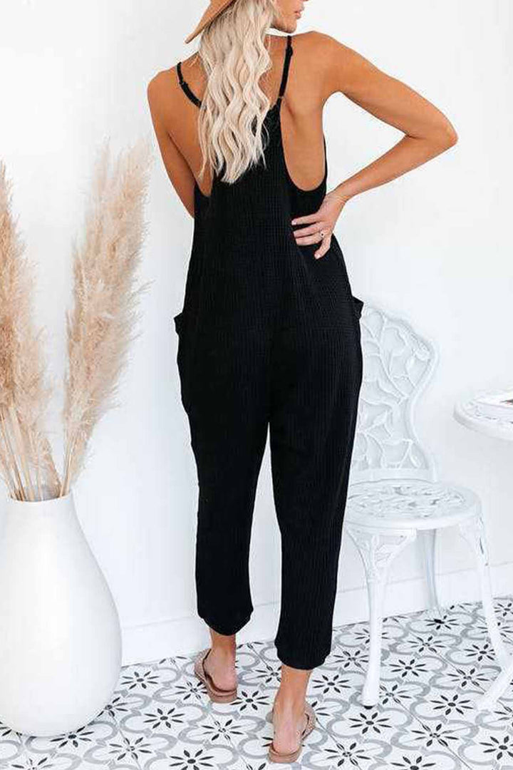 Linde – Wafelstructuur Jumpsuit met Spaghettibandjes en Diepe V-Hals