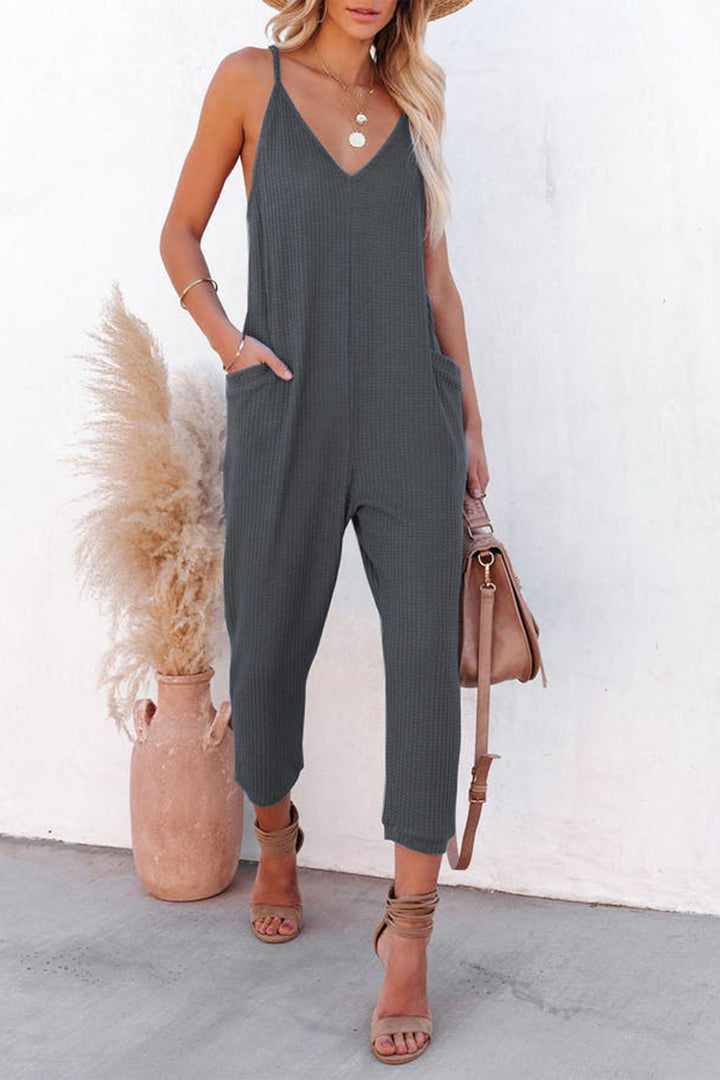 Linde – Wafelstructuur Jumpsuit met Spaghettibandjes en Diepe V-Hals